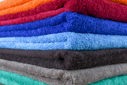 Махровые цветные гладкокрашеные полотенца